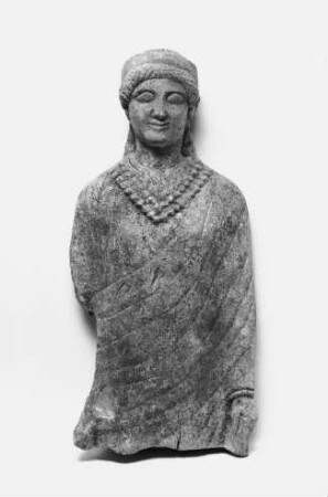 Oberteil einer weiblichen Statuette