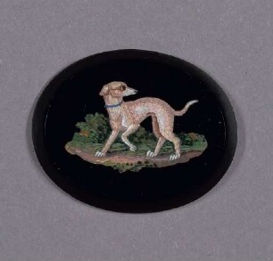 Schwarze Brosche mit laufendem Hund