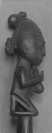 Kniende Figur auf einem Stab der Yoruba