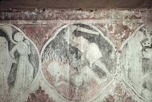 Ein Heiliger liegt im Feuer und wird mit einem Schwert hingerichtet
