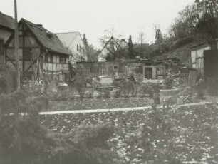 Seitengebäude : Ehem. Bauernhof (1. H. 19. Jh.). Seitengebäude und Wohnhaus (bis zum Erdgeschoß abgetragen)