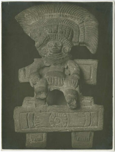 seated deity made of stone