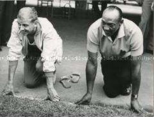 Momentaufnahme während der Olympiade in Rom: Jesse Owens und Armin Hary beim "Start".