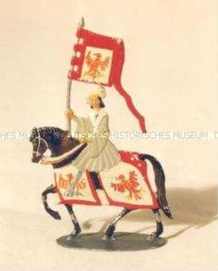Zinnfiguren Festumzug "Tag der Deutschen Kunst": Reiter auf braunem Pferd mit Adlerstandarte