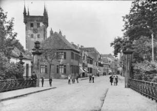 Warendorf, Partie am Münstertor : Warendorf. Münstertor und Münsterstraße, Ecke Münsterwall mit Blick zum Kirchturm der ehemaligen Marienkirche