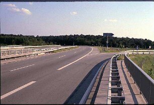 Einfahrt in Kreisel West (Schwetzingen Richtung Heilbronn) von Hauptfahrbahn West der B36 (Schwetzingen Richtung Hockenheim)