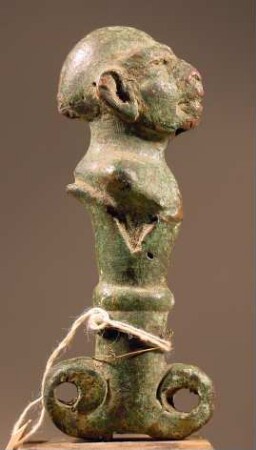 Messergriff mit groteskem Kopf