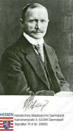 Glässing, Wilhelm, Dr. jur. (1865-1929) / Porträt, linksvorblickendes Brustbild mit faks. Unterschrift