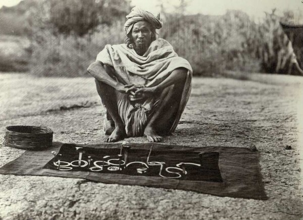 Man with Sacred Snakes