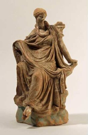 Sitzende Frau