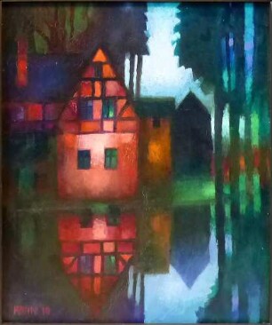 rotes Fachwerkhaus am Teich
