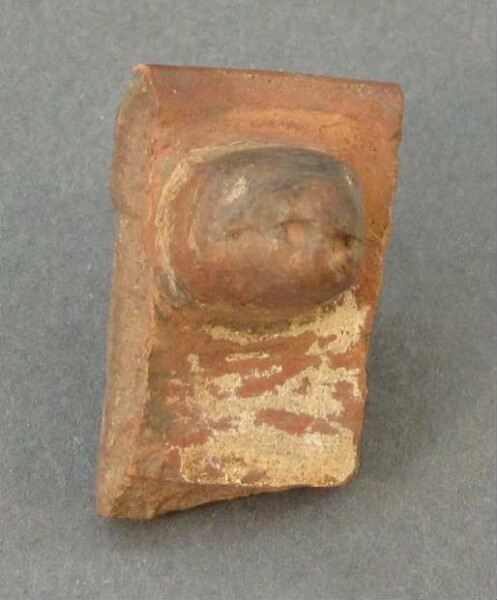 Fragment of a clay vessel