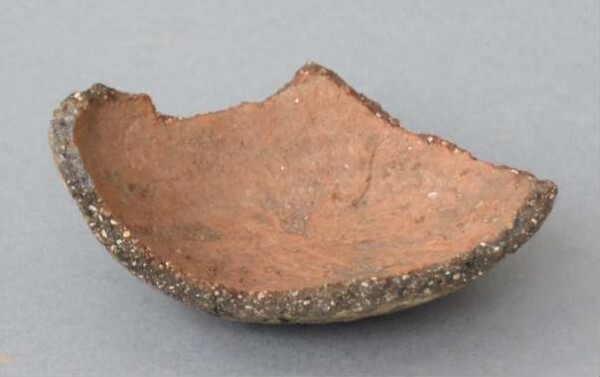 Fragment of a clay vessel