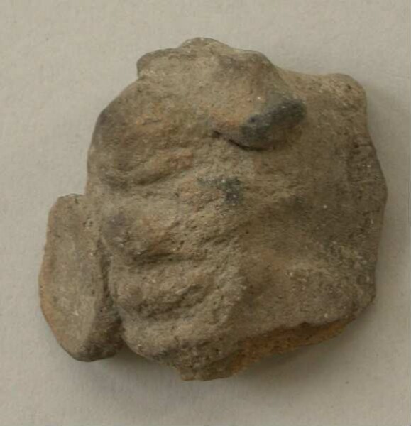 Fragment of a clay vessel