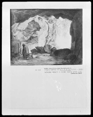 Betender Eremit in einer Grotte