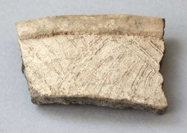 Fragment of a clay vessel