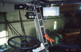 Monitore zur Ertragsermittlung in der Kabine des Mähdreschers