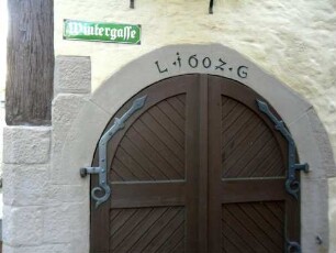 Stadtbild-Schloßstraße - Haus 54 (Ecke Wintergasse) - Doppelflügelige Tür mit Jahreszahl 1602 und Initialen L G im Schlußstein des Bogens