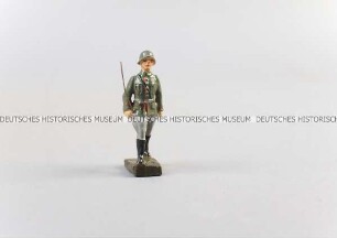 Massefigur: Soldat marschierend, Degen rechts