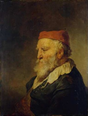 Ein alter Mann mit roter Kappe