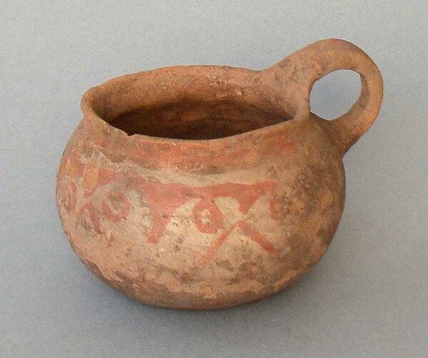 Clay vessel with handle