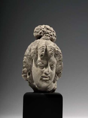 Kopf eines Bodhisattva mit Korkenzieherlocken