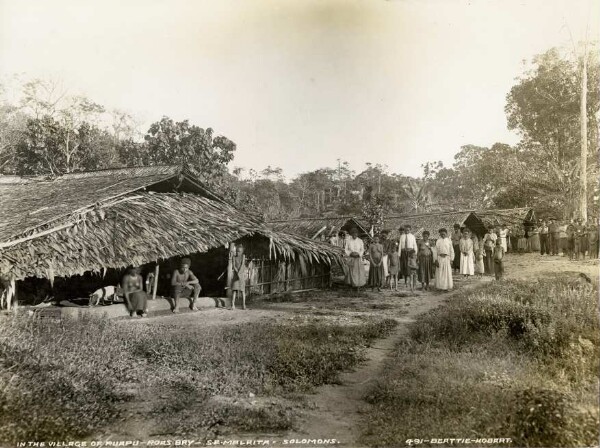 "In the village of Ruapu; Roas-Bay, S.O. Malaita"