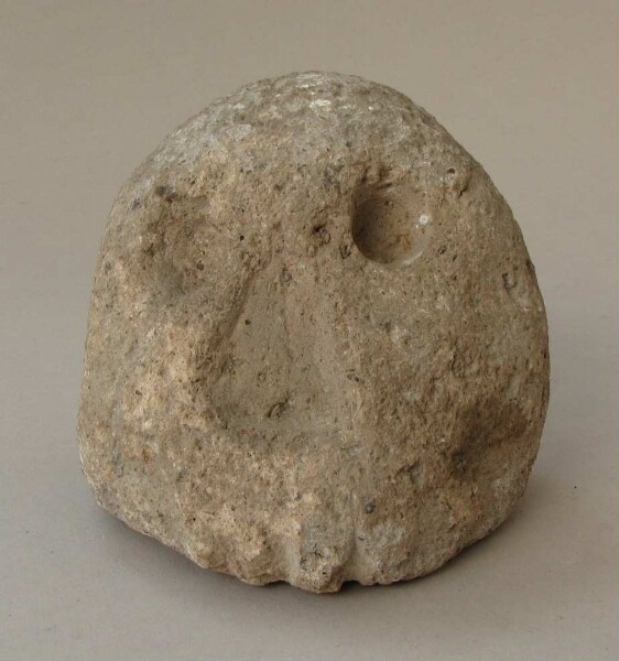 Stone head (fragment)