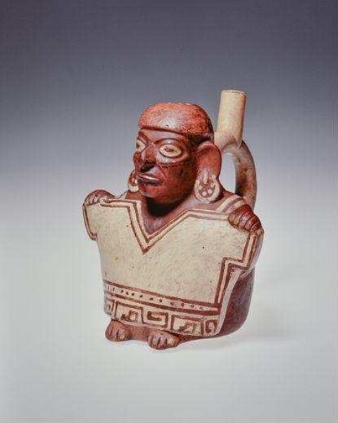 Stirrup spout vessel; a man holding a shirt in front of him