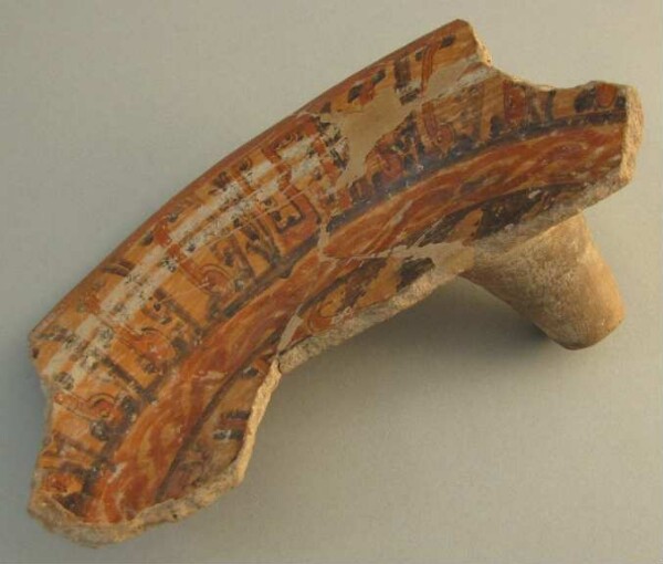 Fragment of a clay vessel