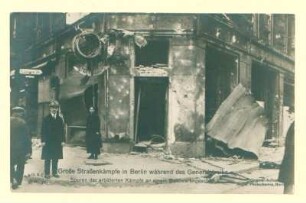 Novemberrevolution: "Große Straßenkämpfe in Berlin während des Generalstreiks. Spuren der erbitterten Kämpfe an einem Goldwarengeschäft.