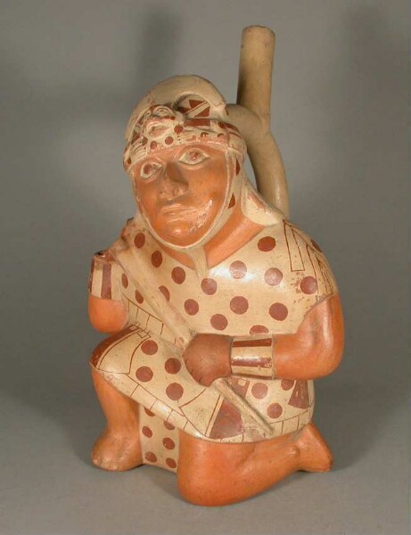 Kneeling anthropomorphic figure