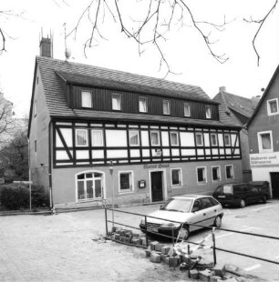 Bad Schandau, Marktstraße 10. Wohnhaus mit Gaststätte "Zum Roten Haus" (1801/1850). Straßenansicht von Westen