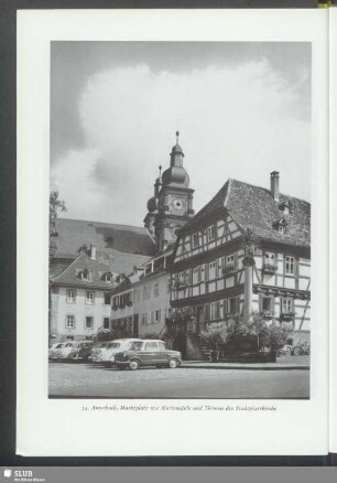 Amorbach, Marktplatz mit Mariensäule und Türmen der Stadtpfarrkirche