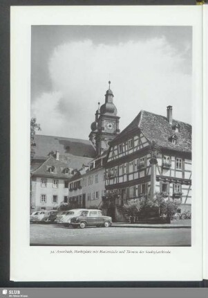 Amorbach, Marktplatz mit Mariensäule und Türmen der Stadtpfarrkirche