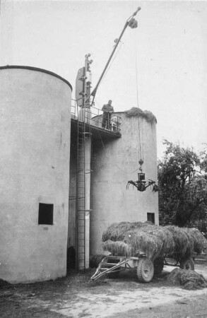 Fotografie: Ein- und Auslagerungstechnik, Hochsilo, Greiferanlage