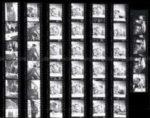 Schwarz-Weiß-Negative mit Aufnahmen einer Straßenbahnschaffnerin, eines Zeitungsfahrers, sowie Gerhard Gronefelds Kindern