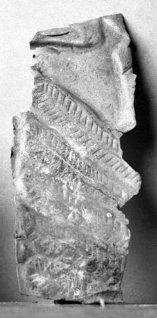 Fragment eines getriebenen Blech (mit Rest eines Flügels?)