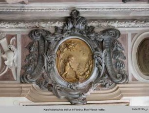 Wandfries : Reliefmedaillon mit Putto und Hühnervogel