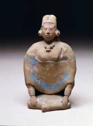Sitzende Frau