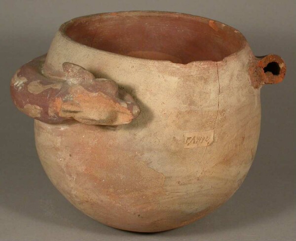 Clay trumpet on a vessel