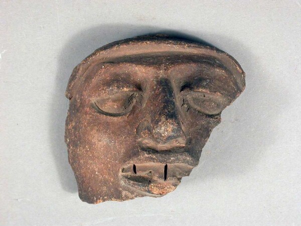 Fragment of a clay vessel