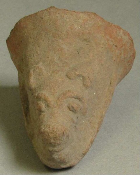 Clay animal head as a vessel base