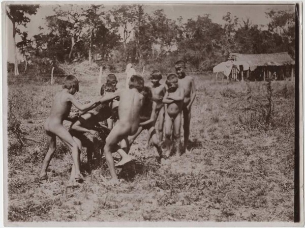 Toba children playing near Asunción