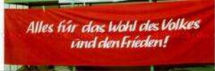 Transparent "Alles für das Wohl des Volkes und den Frieden!"