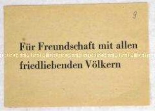 Handzettel der SED (?) mit einer Propaganda-Losung für Völkerfreundschaft