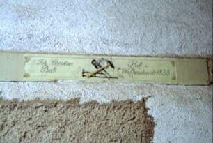 Türsturz der ehemaligen Schmiede in der Torfahrt mit Inschrift: "Joh. Christian Beck Huf- und Waffenschmidt 1838"