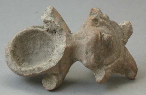 Fragment of a clay rattle (clay head)