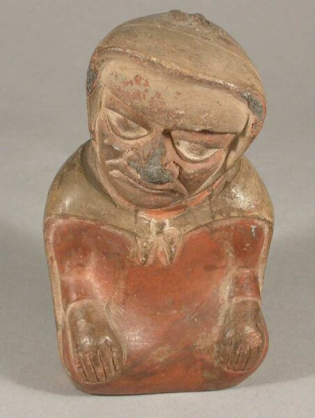 Seated anthropomorphic figure