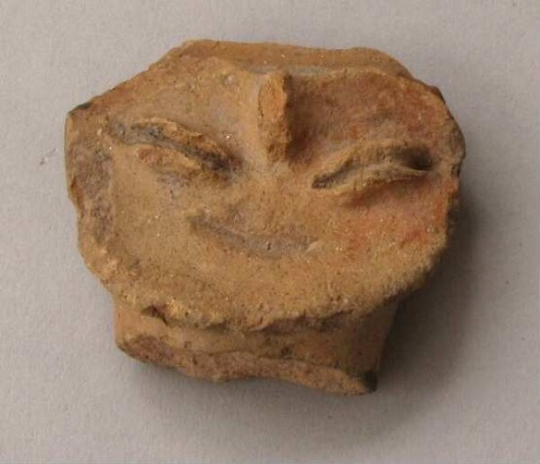 Clay figure (fragment)